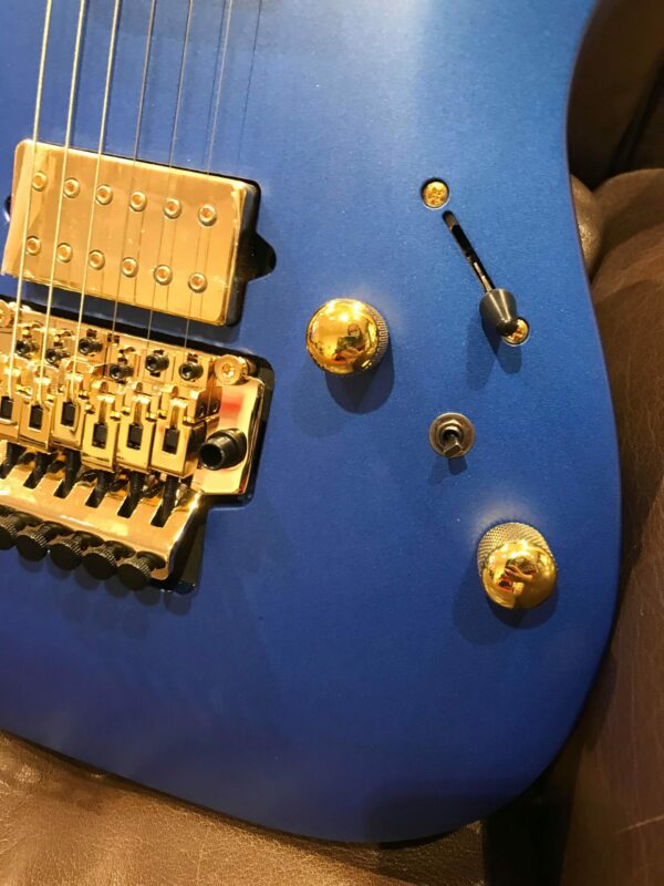 boutons dorés de guitare électrique