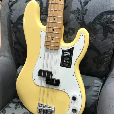 guitare basse jaune et blanche