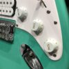 boutons blancs guitare bleu vert